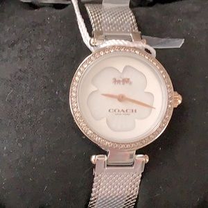 NWT-Coach  Brand new silver mesh two tone watch.
Comes in its box